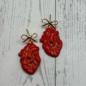 Red Anatomical Heart-Shaped Earrings with Gold Bow